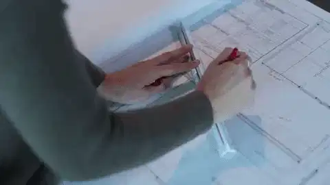 A blueprint or civil engineering drafting animation showing technical designs