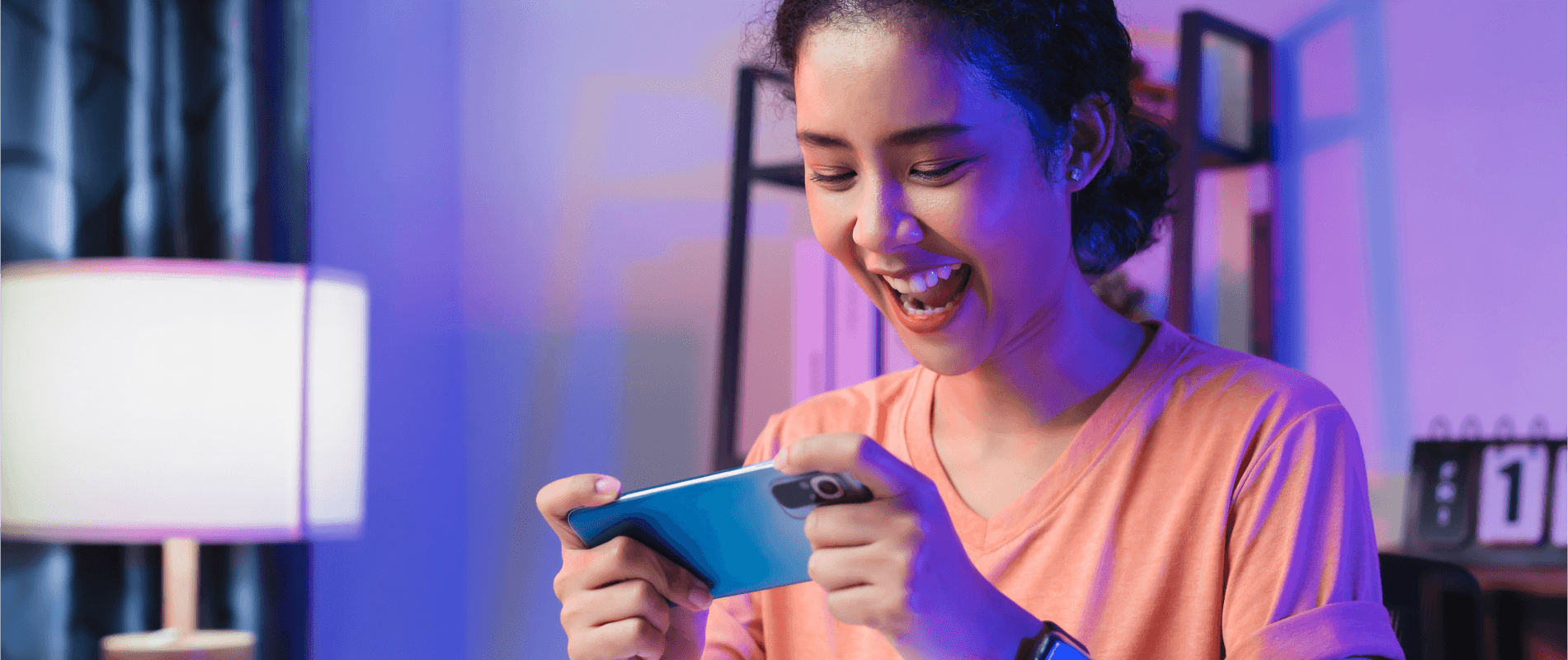 Person holding a mobile phone