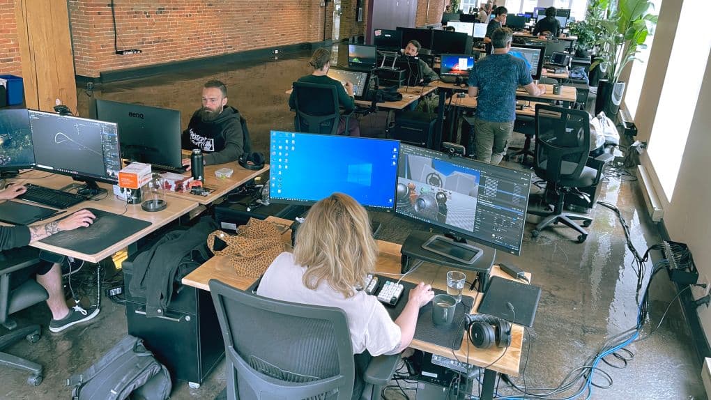 Pic of team members working at Monster Closet offices