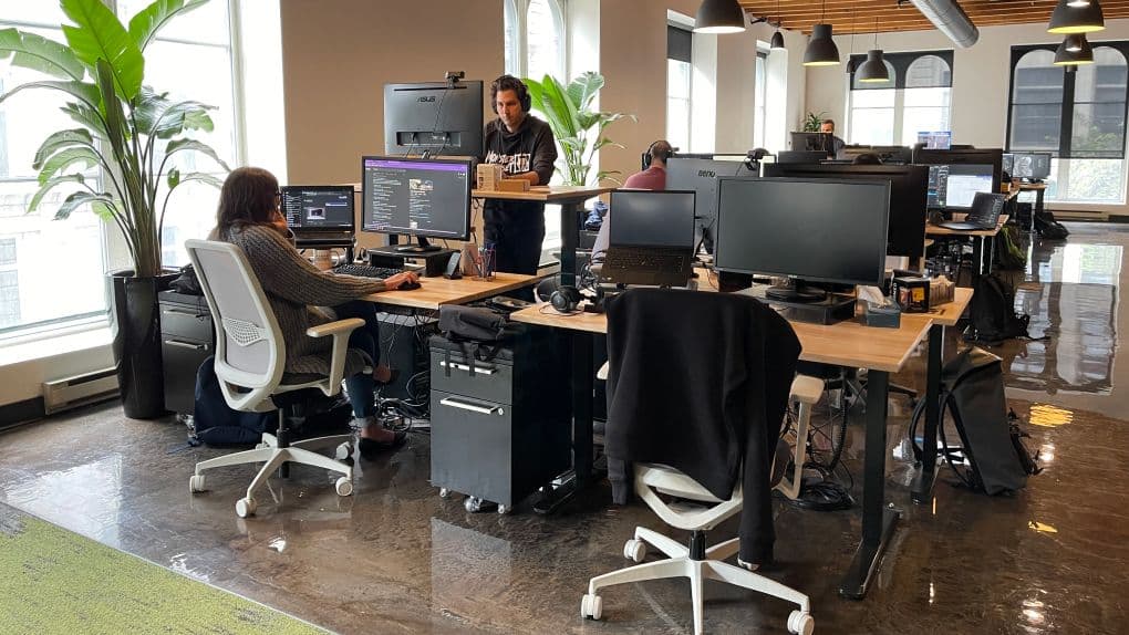Capture of Monster Closet team in-office while working with Unity