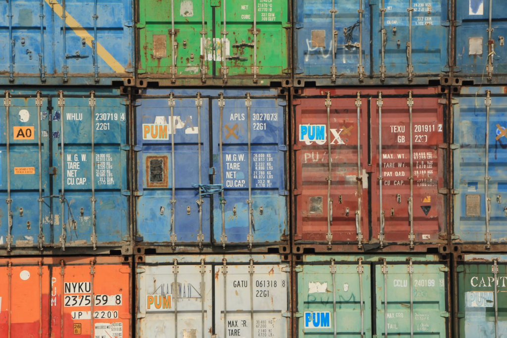 Image of containers stacked on top of each other (Tim G for Unsplash).