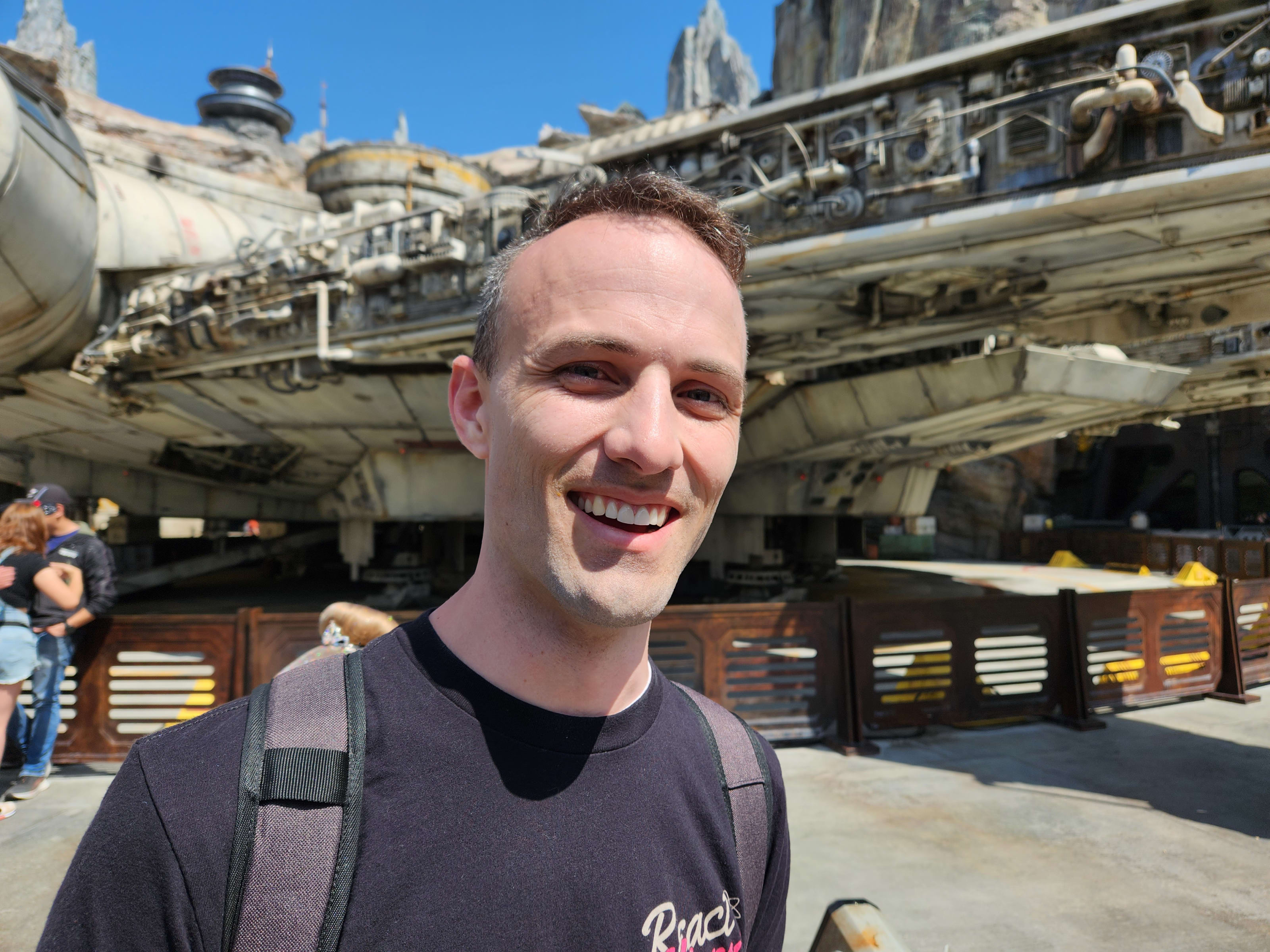 Kent standing in front of the Millennium Falcon at Disneyland