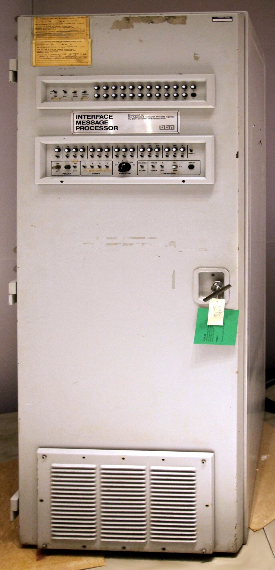 BBN Interface Message Processor (IMP), a refrigerator-sized cabinet with a front panel of toggle switches and indicator lights