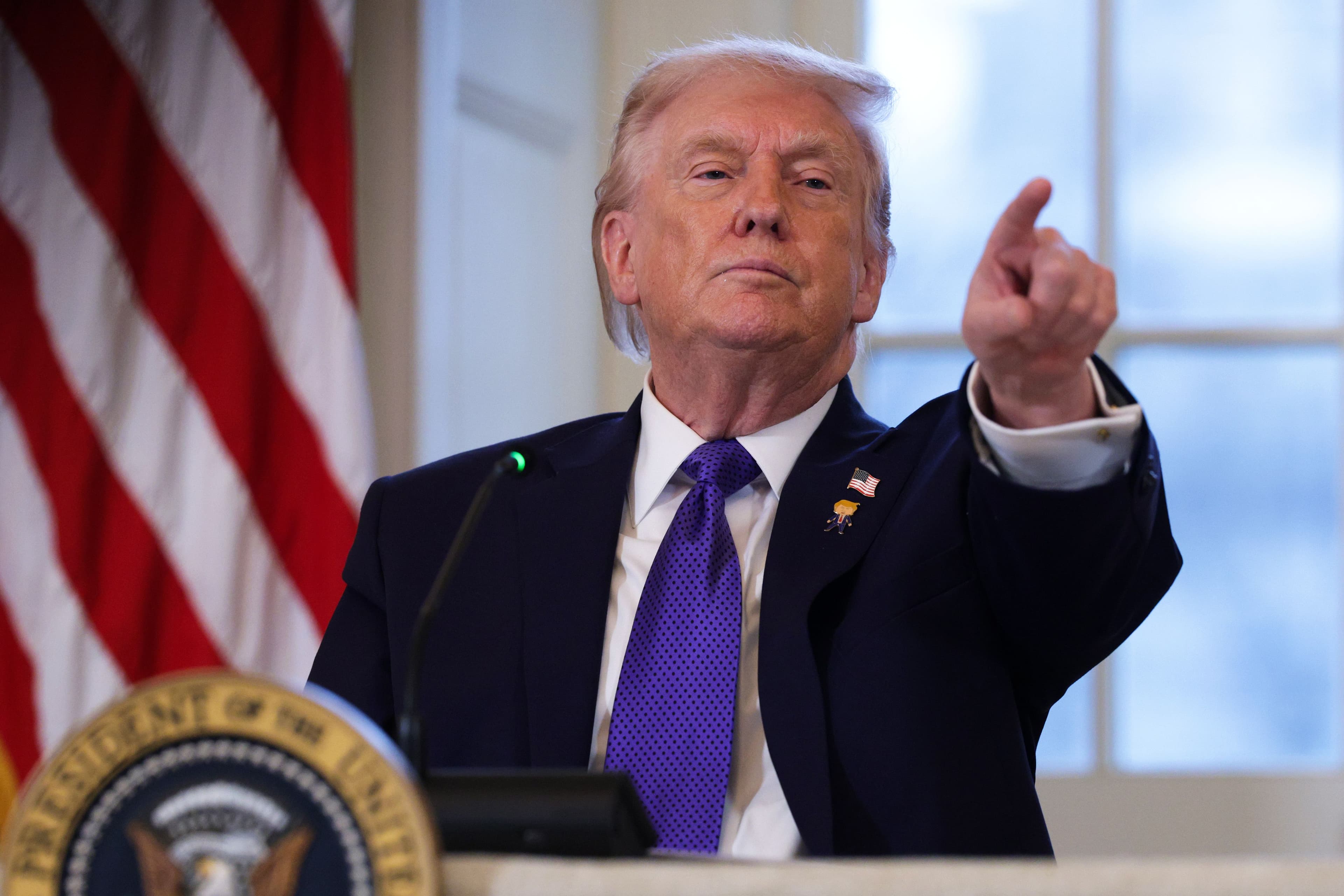 Donald Trump points at the audience during a press conference at the White House (Getty Images)