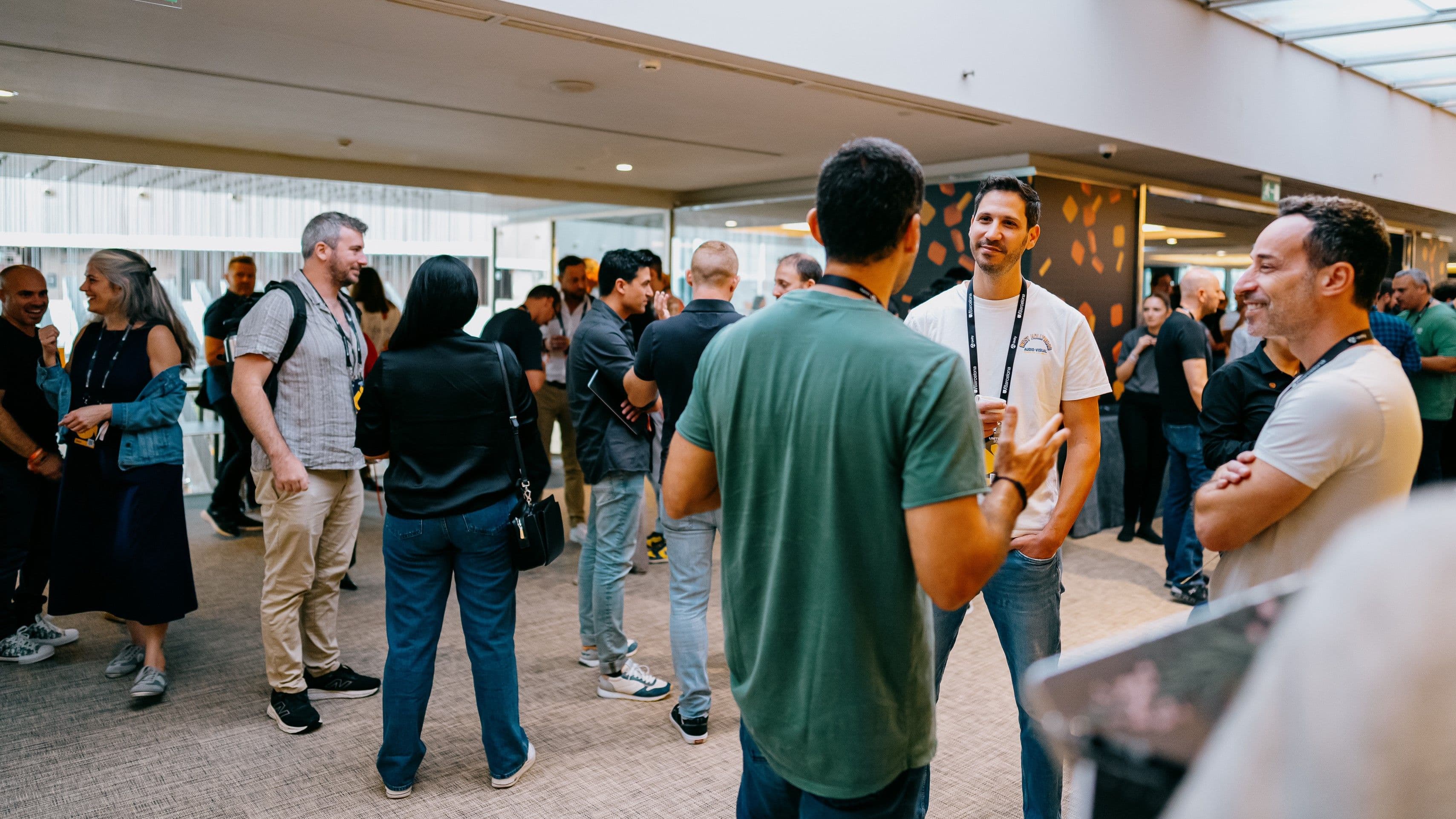 Appfest attendees networking between sessions
