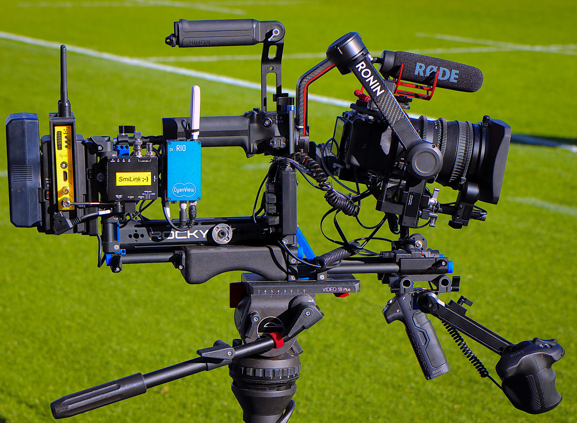 Cyanview RIO device mounted on a camera at a sports field