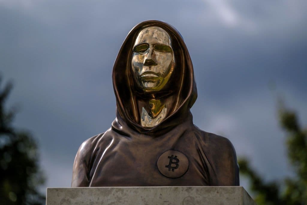 A statue of Satoshi Nakamoto, a presumed pseudonym used by the inventor of Bitcoin, is displayed in Graphisoft Park on September 22, 2021 in Budapest, Hungary. The statue's creators, Reka Gergely and Tamas Gilly, used anonymized facial features, as Nakamoto's true identify remains unconfirmed. (Photo by Janos Kummer/Getty Images)