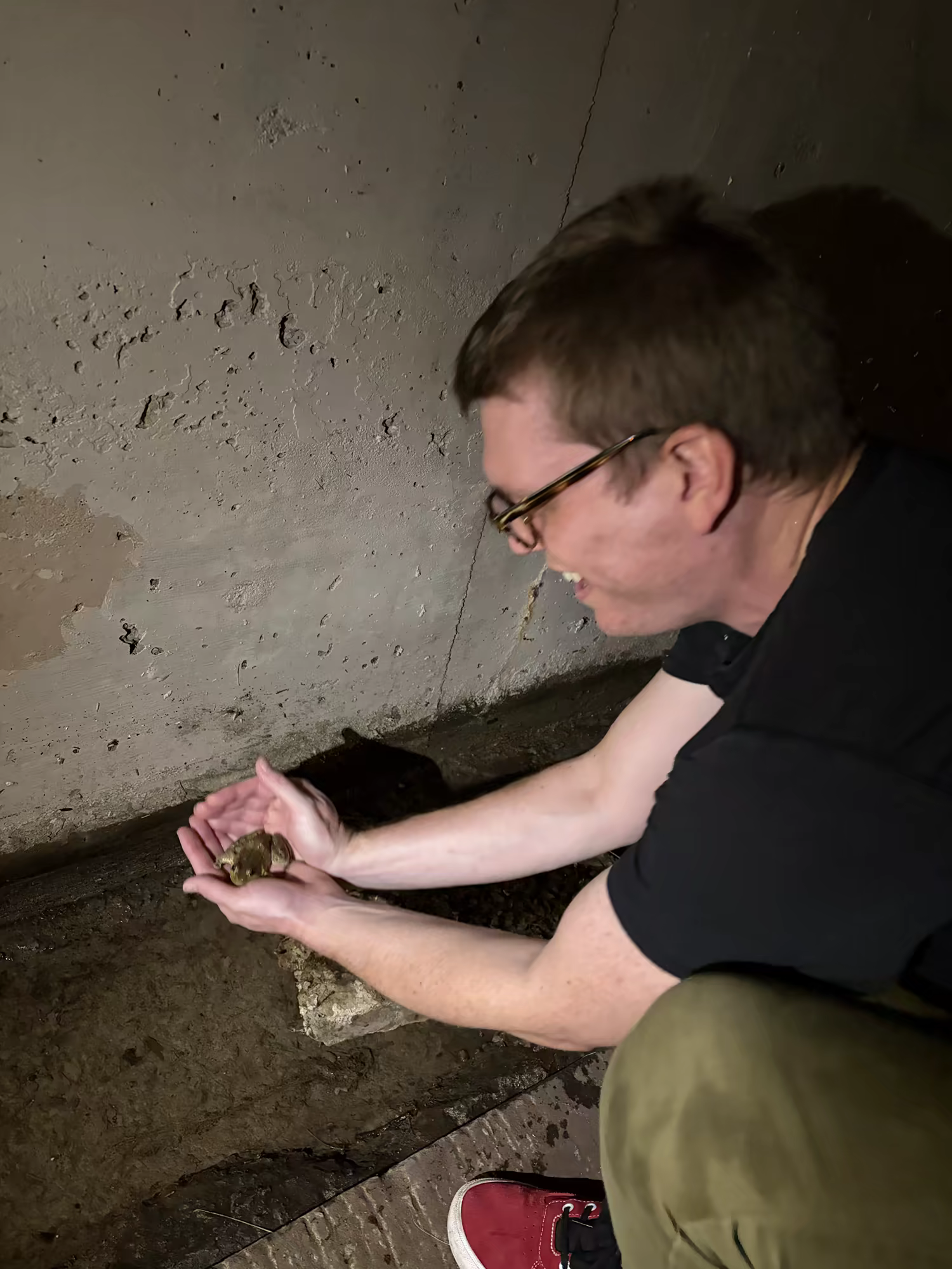 Andrew Kelley befriending a frog on the MKT trail