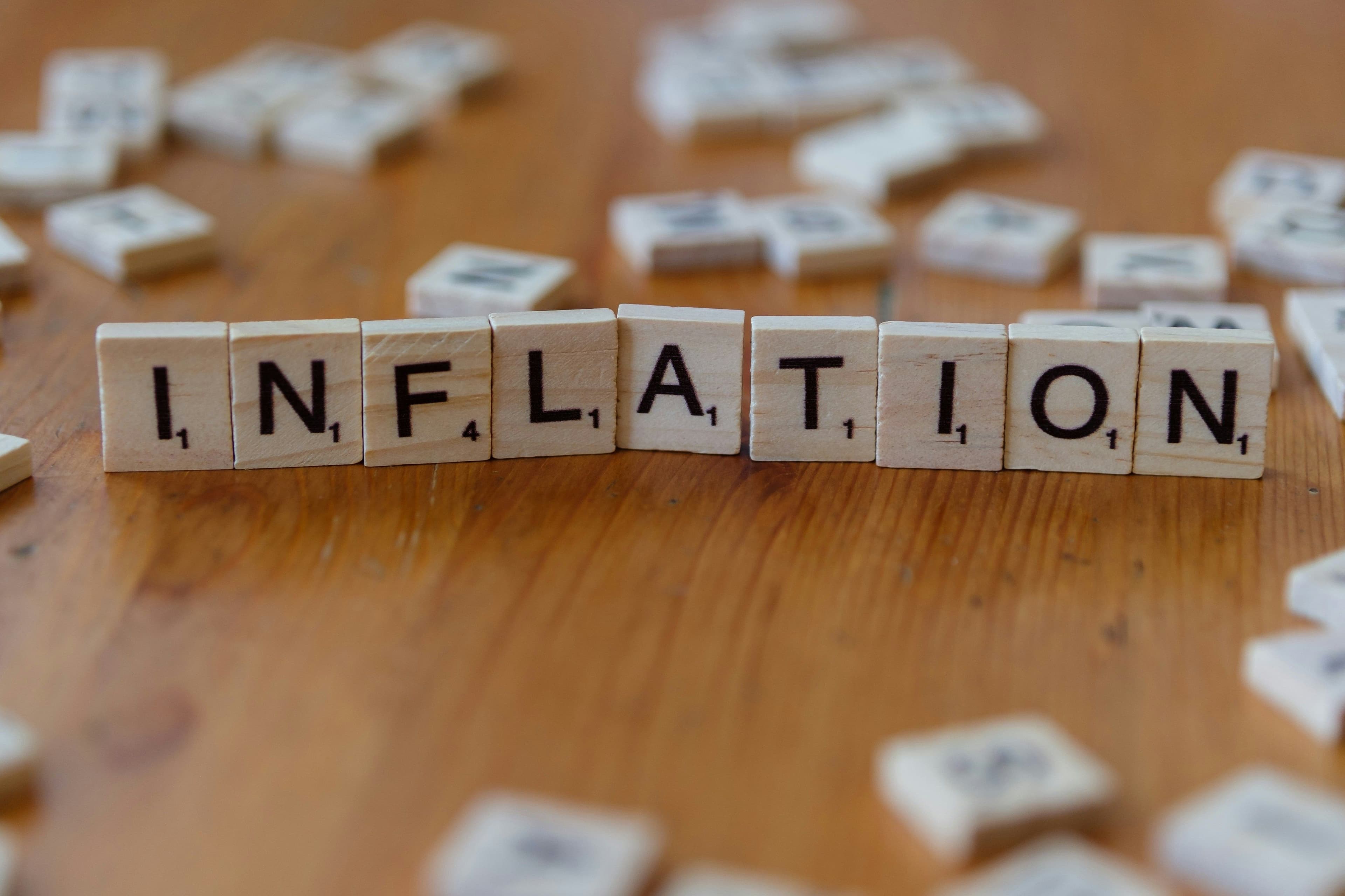 Wooden block tiles spell out the word "inflation." (Markus Winkler/Unsplash)