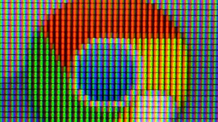 Zoom in on the Chrome logo being displayed on an LCD screen