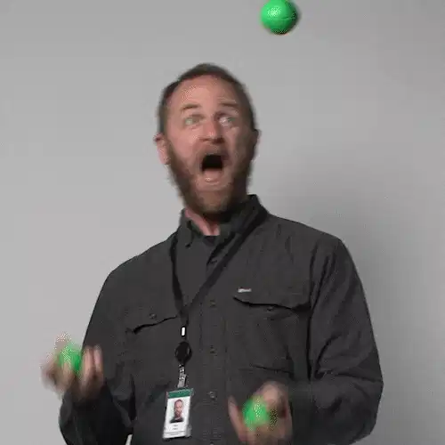 A person juggling multiple items while working