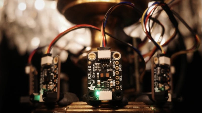An ESP32 and Eight ToF Sensors Give This Antique Lamp a Sixth Sense