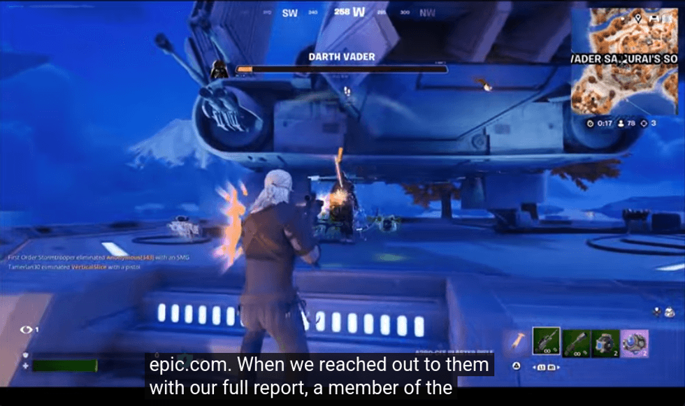 Fortnite player battles Darth Vader beneath a starship on a blue-lit platform